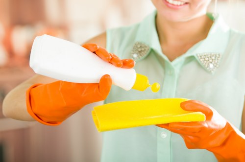 Staff wearing PPE during professional carpet cleaning in Balham